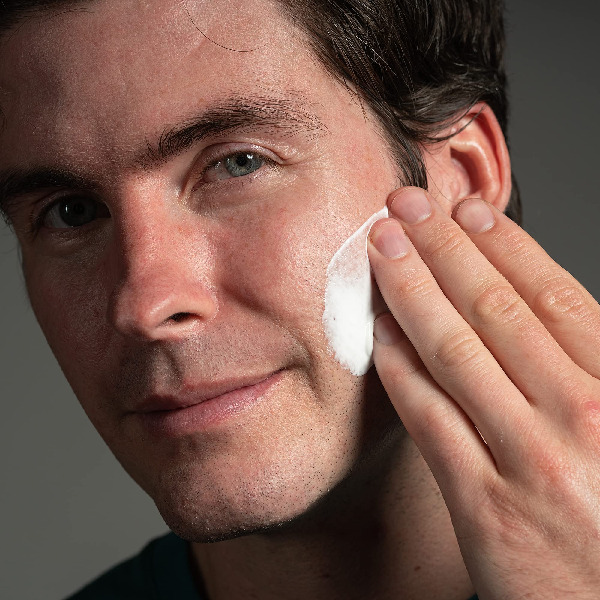 Front packaging displays paraben-free, dermatologist-tested formula.