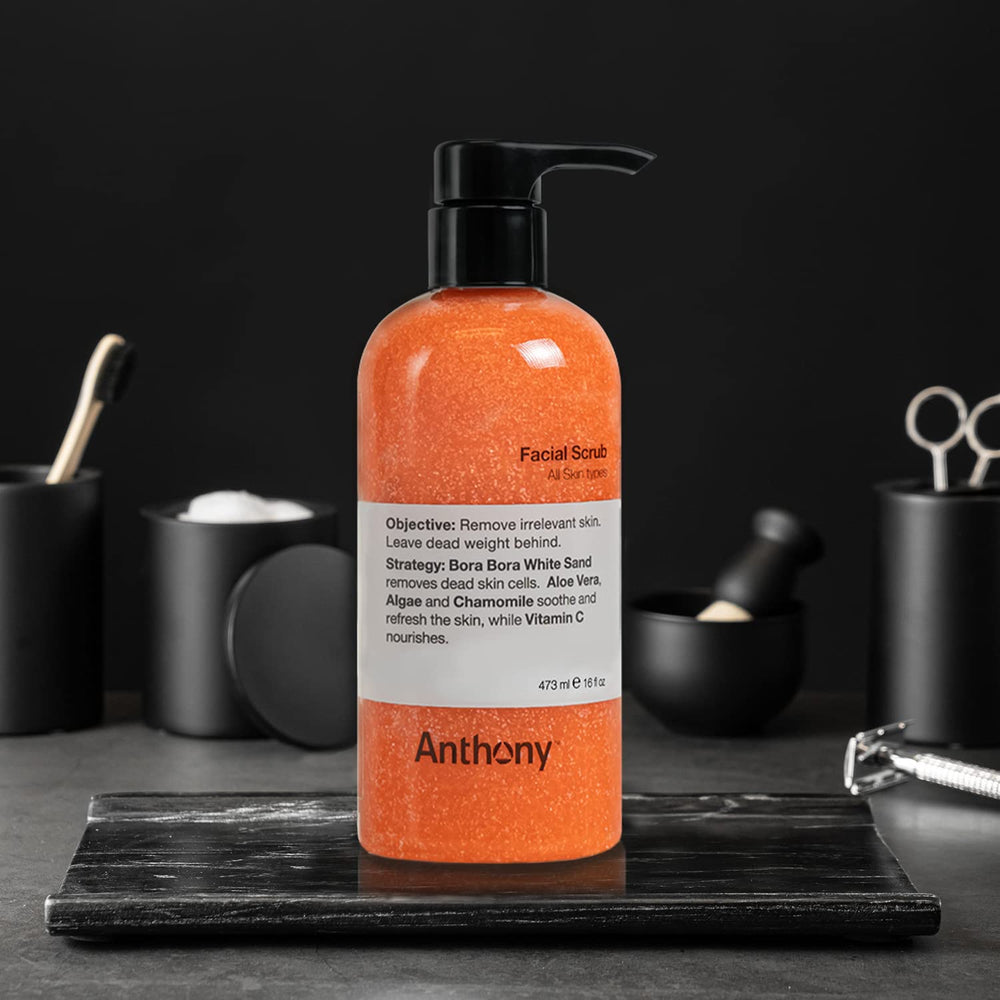 Anthony Facial Scrub beads closeup shows sand exfoliation for smoother skin.