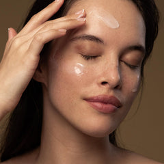 Applying Antipodes Culture Probiotic Night Recovery Water Cream shows hydrating texture.
