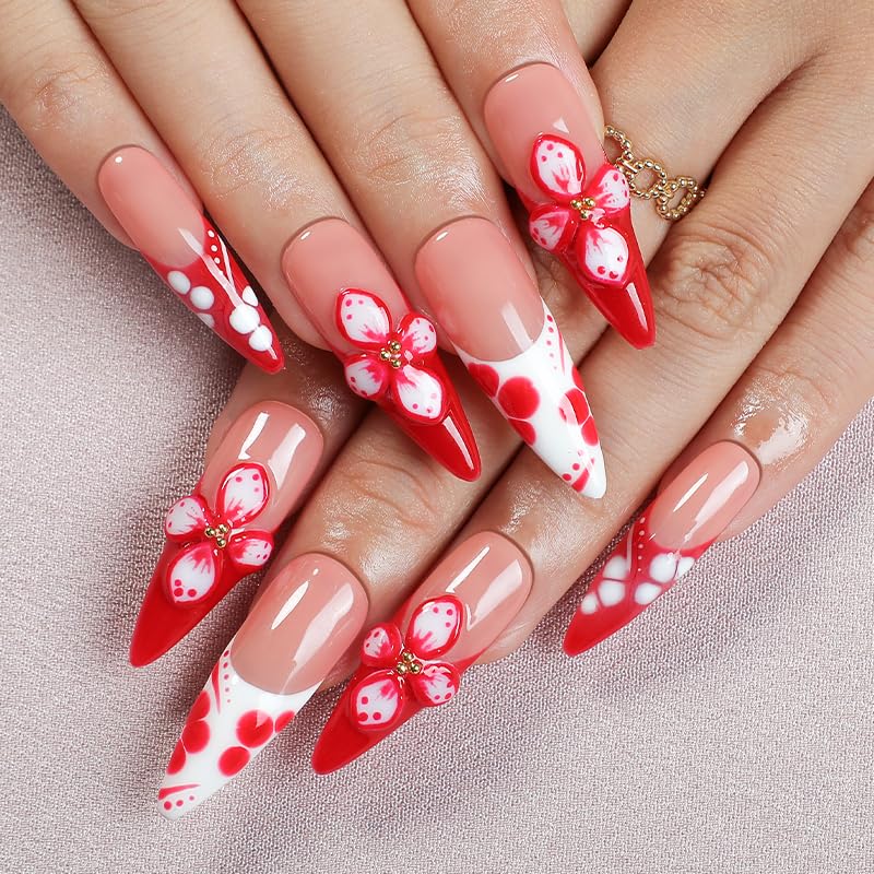Appife red French tips with white polka dots ideal for Valentine looks.