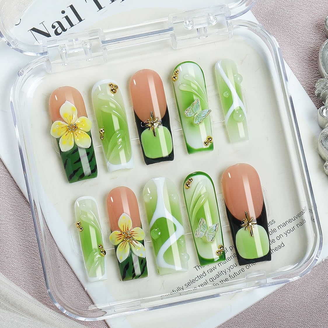 Appife white swirl design nails for a clean, modern look.
