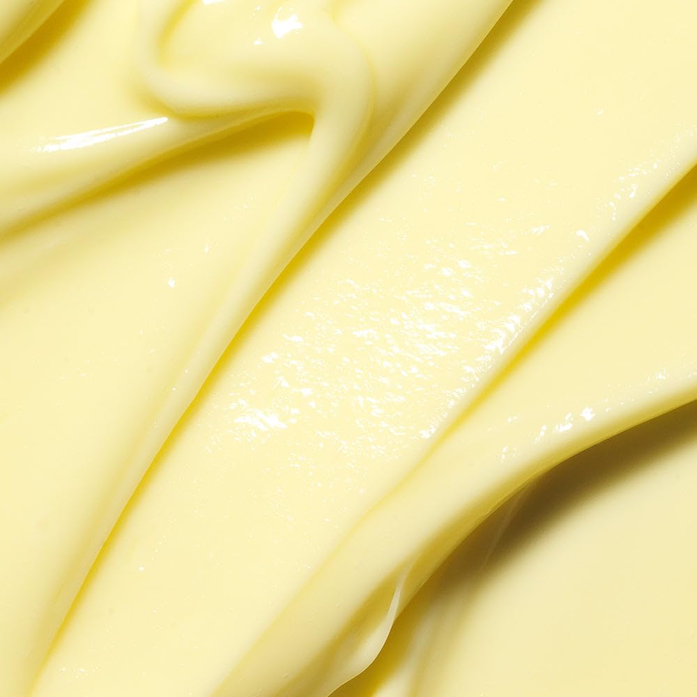 Applying APRILSKIN Carrotene Clarifying Cream to the face for even coverage