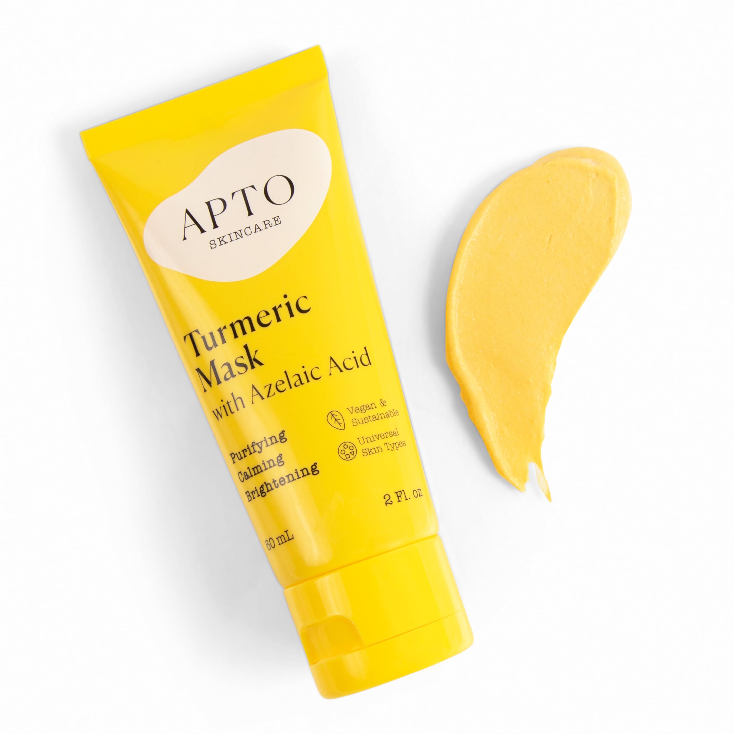 APTO Turmeric Mask spread on skin shows smooth, even application.