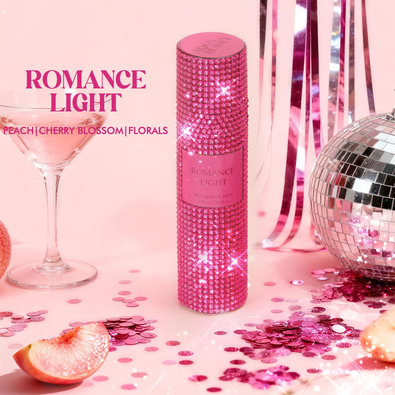 Aqua Blance diamond-embellished bottle catching light for gifting appeal.