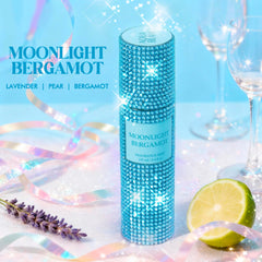 Aqua Blance Moonlight Bergamot fragrance mist bottle shows a diamond-embellished cap catching light.