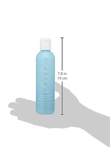 Aquage Color Protecting Conditioner applied to hair demonstrates detangling and smoothness.