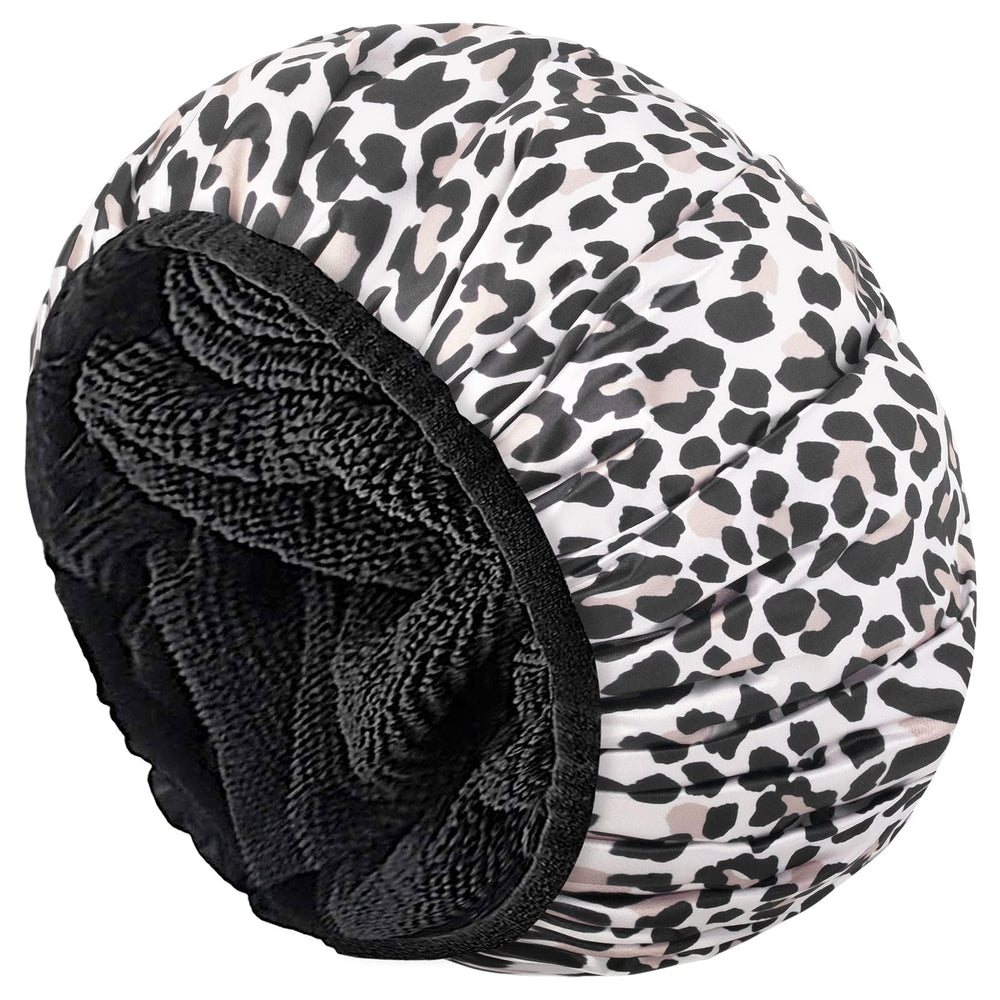 Aquior leopard shower cap exterior satin finish keeps hair dry during showers.