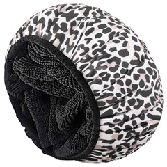 Aquior leopard shower cap exterior satin finish keeps hair dry during showers.