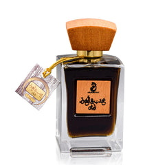 ARABIYAT Khashab & Oud cap close-up highlighting cedarwood notes.