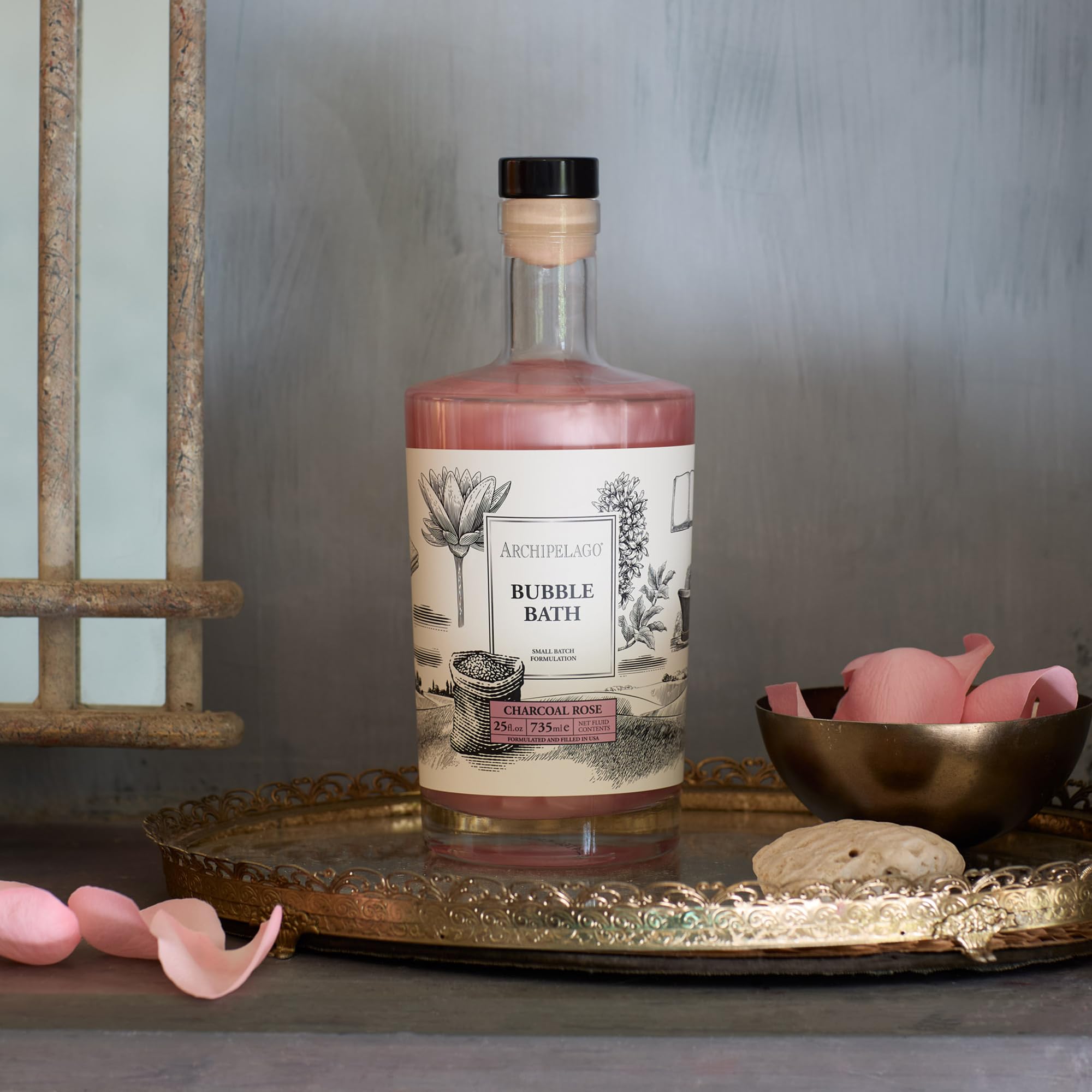 Archipelago Botanicals Charcoal Rose Bubble Bath bottle ready for a relaxing soak.