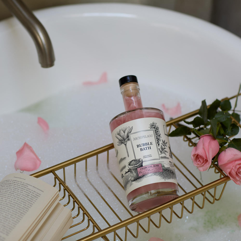 Archipelago Botanicals Charcoal Rose Bubble Bath rich lather for gentle cleansing.