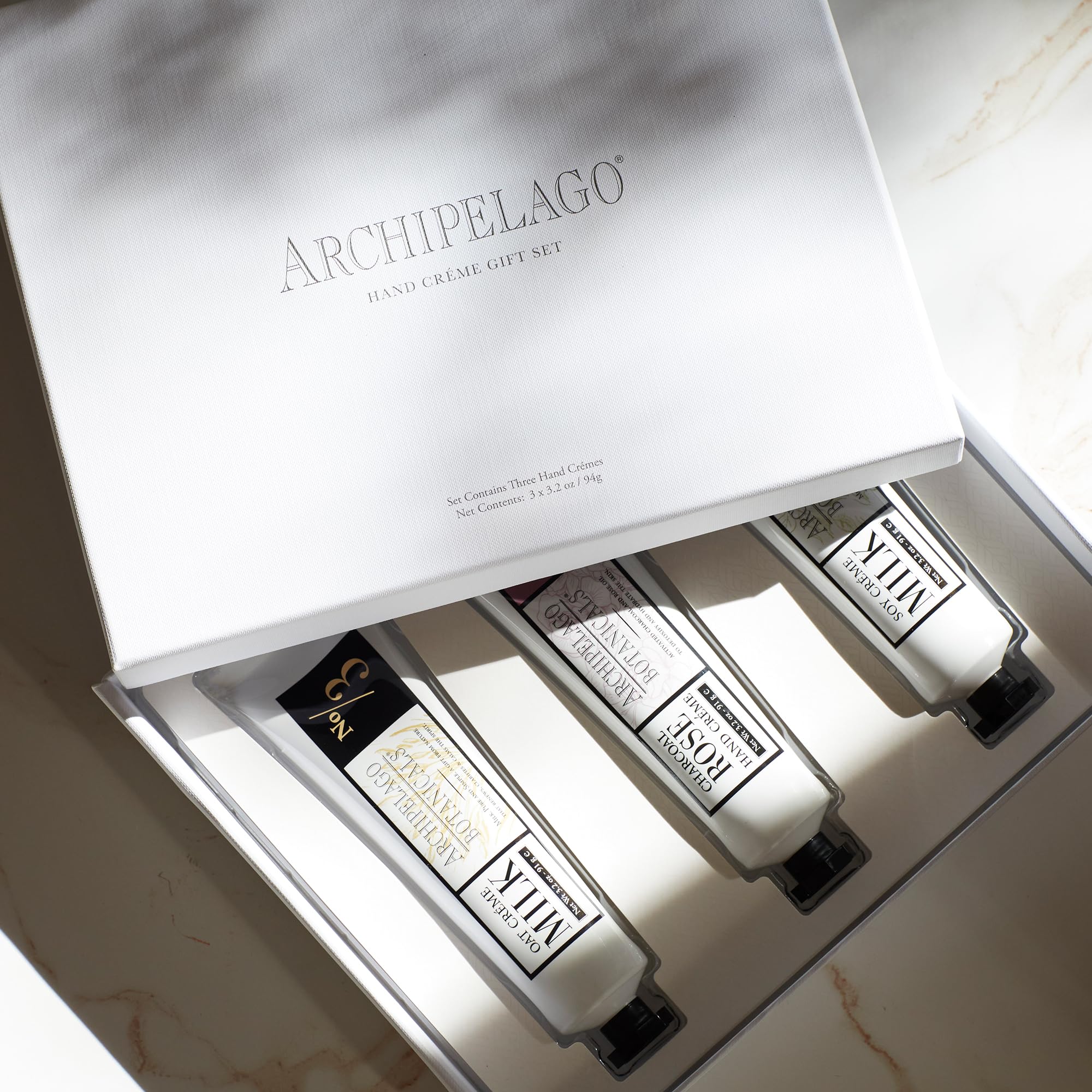 Archipelago Botanicals Hand Creme ingredients; oat, soy, charcoal rose highlights