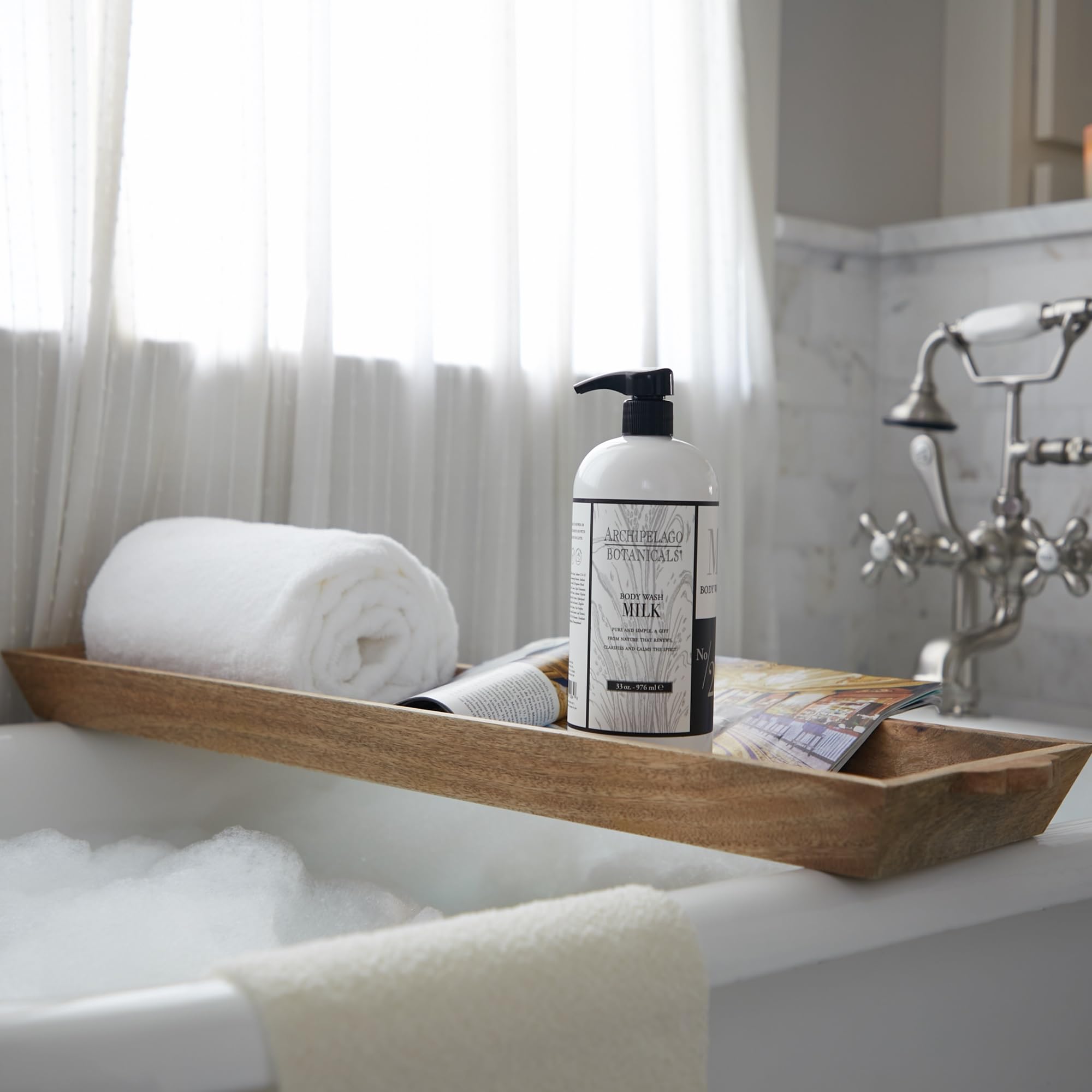 Archipelago Botanicals Milk Body Wash bottle with rich lather—creamy cleansing for sensitive skin
