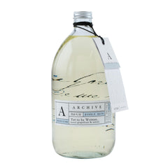 Archive Yet to be Written bubble bath bottle pouring for a soothing soak