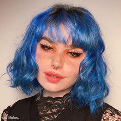 Applying Poseidon to hair to achieve even blue tone with conditioning formula.