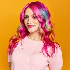 Arctic Fox Virgin Pink being applied to hair for vibrant pink results.