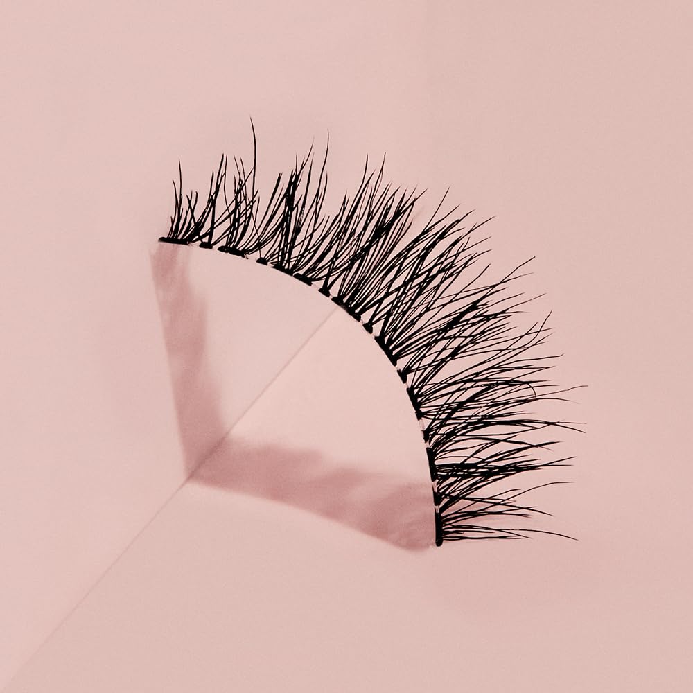 Ardell mid-length wispy lashes create subtle eye lift.