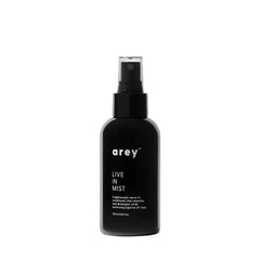 Arey Live-In Mist Leave-In Conditioner bottle offering lightweight hydration and UV protection