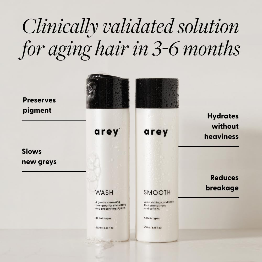 Arey Shower Duo conditioner bottle—smooth conditioner reduces breakage and boosts hydration.