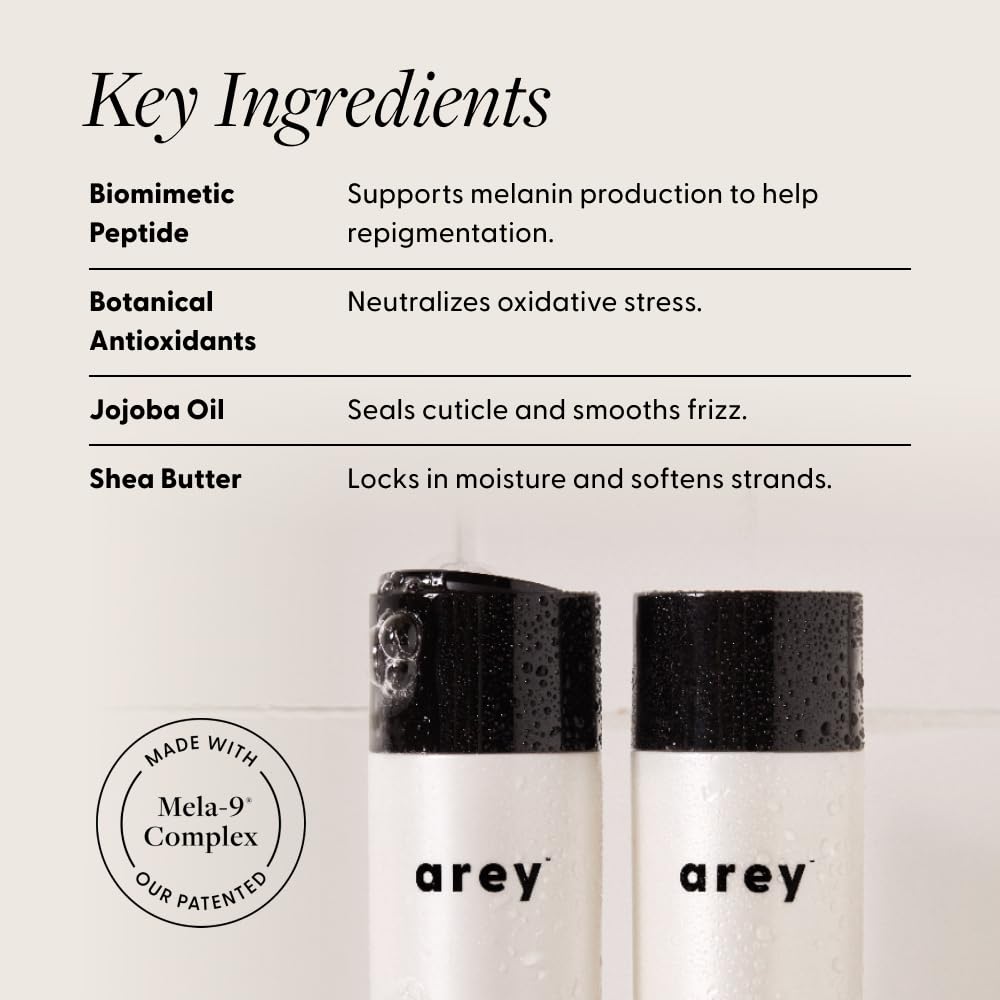 Arey Shower Duo conditioner texture closeup—silky formula seals cuticle for smooth hair.