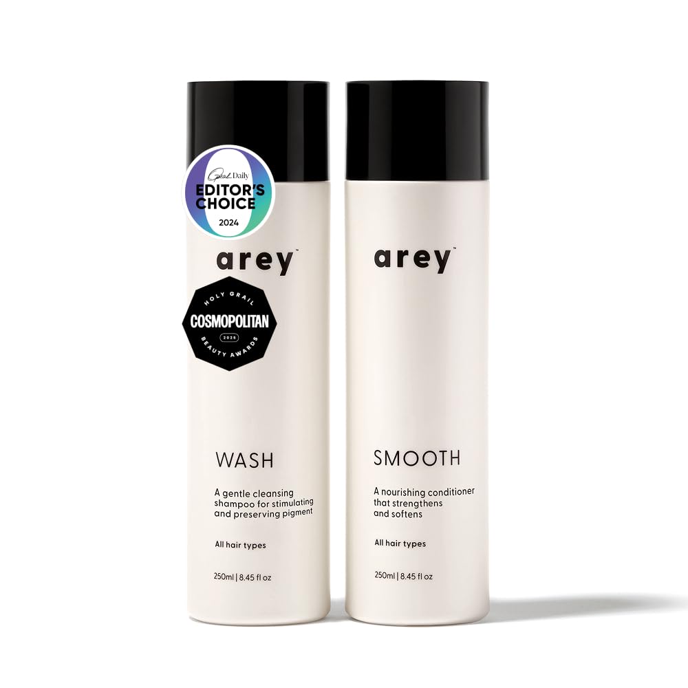 Arey Shower Duo shampoo bottle—daily wash formula helps preserve pigment and scalp health.