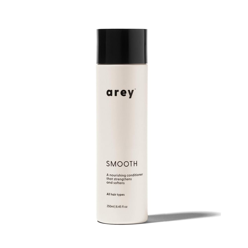 Arey Smooth Conditioner bottle pour demonstrates easy application and hydration