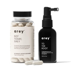 Arey System daily hair serum bottle closeup for smooth, healthy-looking hair.
