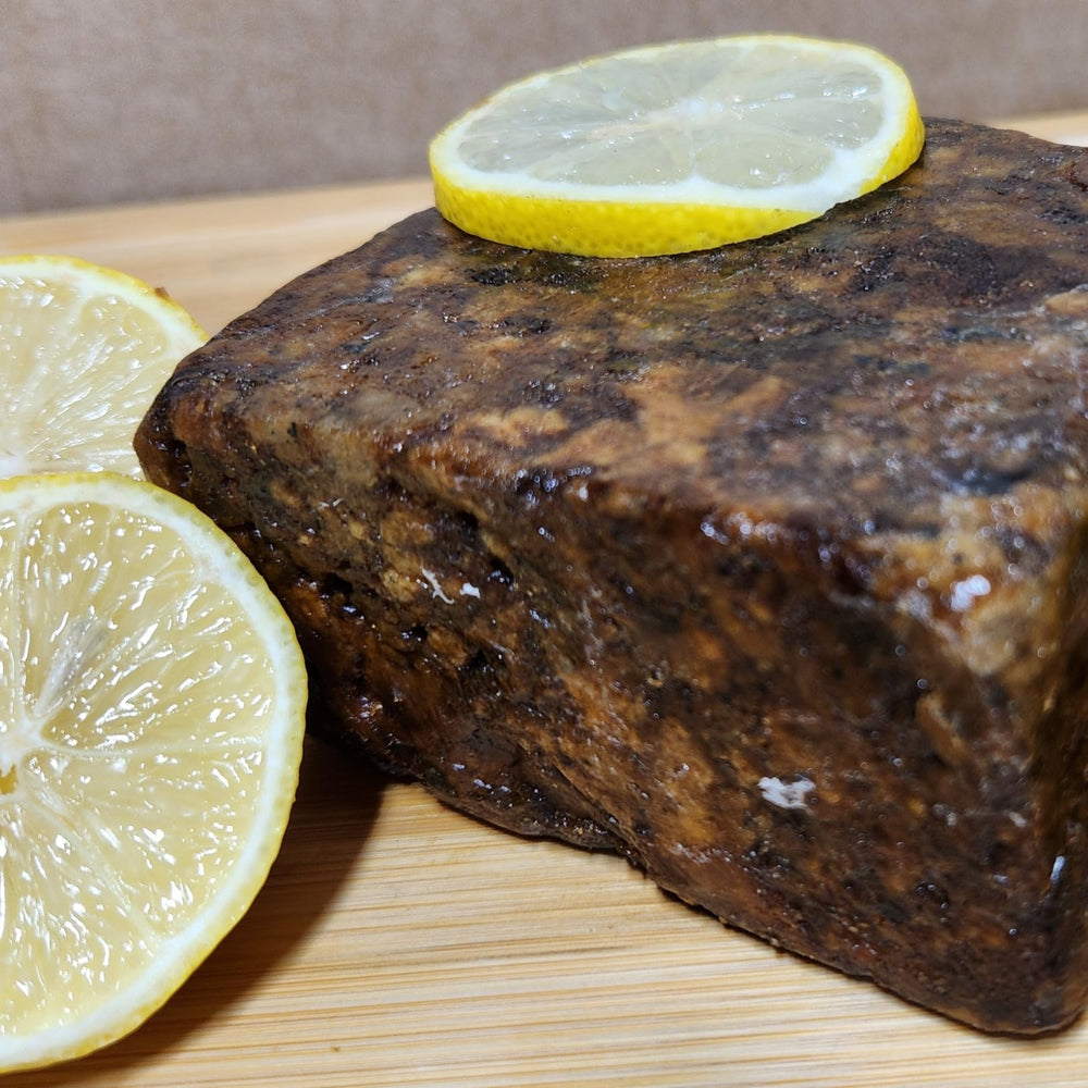 Aroma Depot Lemon African Black Soap bar cleanses skin and supports fresh starts.