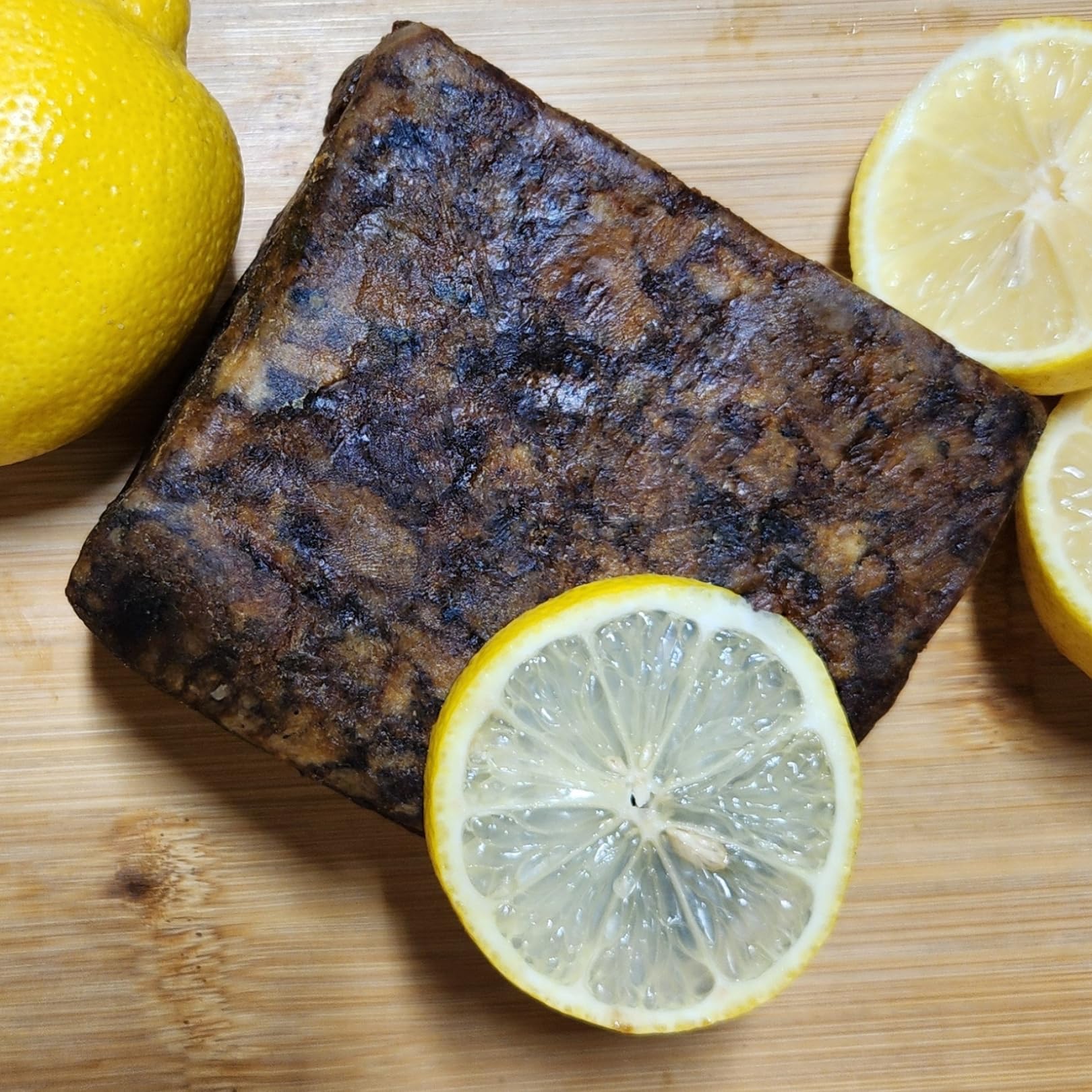 Aroma Depot Lemon African Black Soap ingredients include plantain, cocoa pods, palm leaves, and shea.