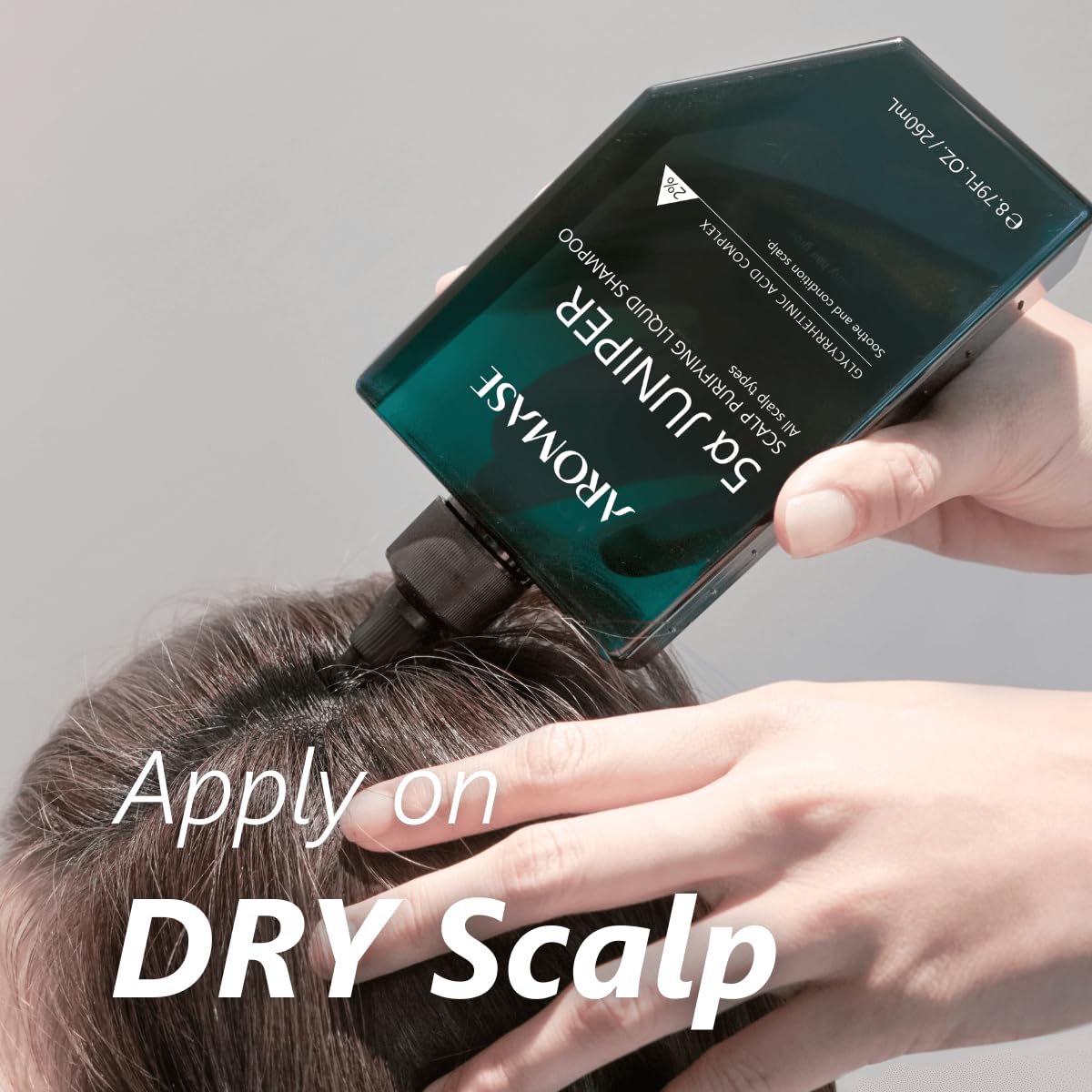Aromase 5 Juniper Purifying Liquid Shampoo label highlights glycyrrhetinic complex benefits.