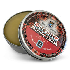 Aromastories Patchouli Musk body butter jar close-up showing rich, silky texture.