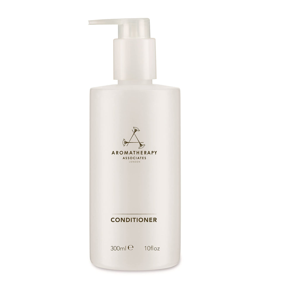 Aromatherapy Associates conditioner bottle-pour shows lightweight hydration for all hair types.