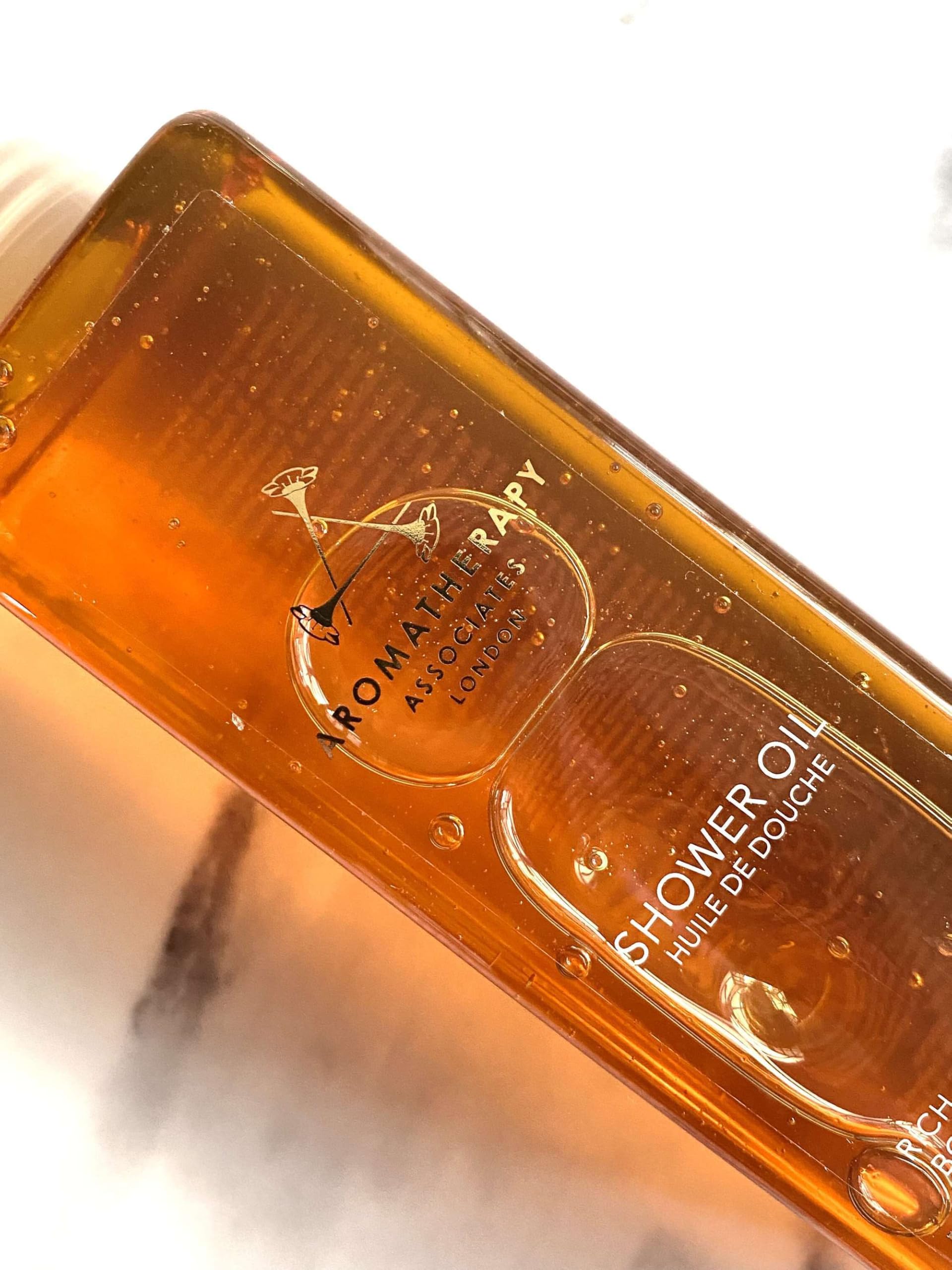 Aromatherapy Associates De-Stress Muscle Shower Oil ready for a mindful massage.