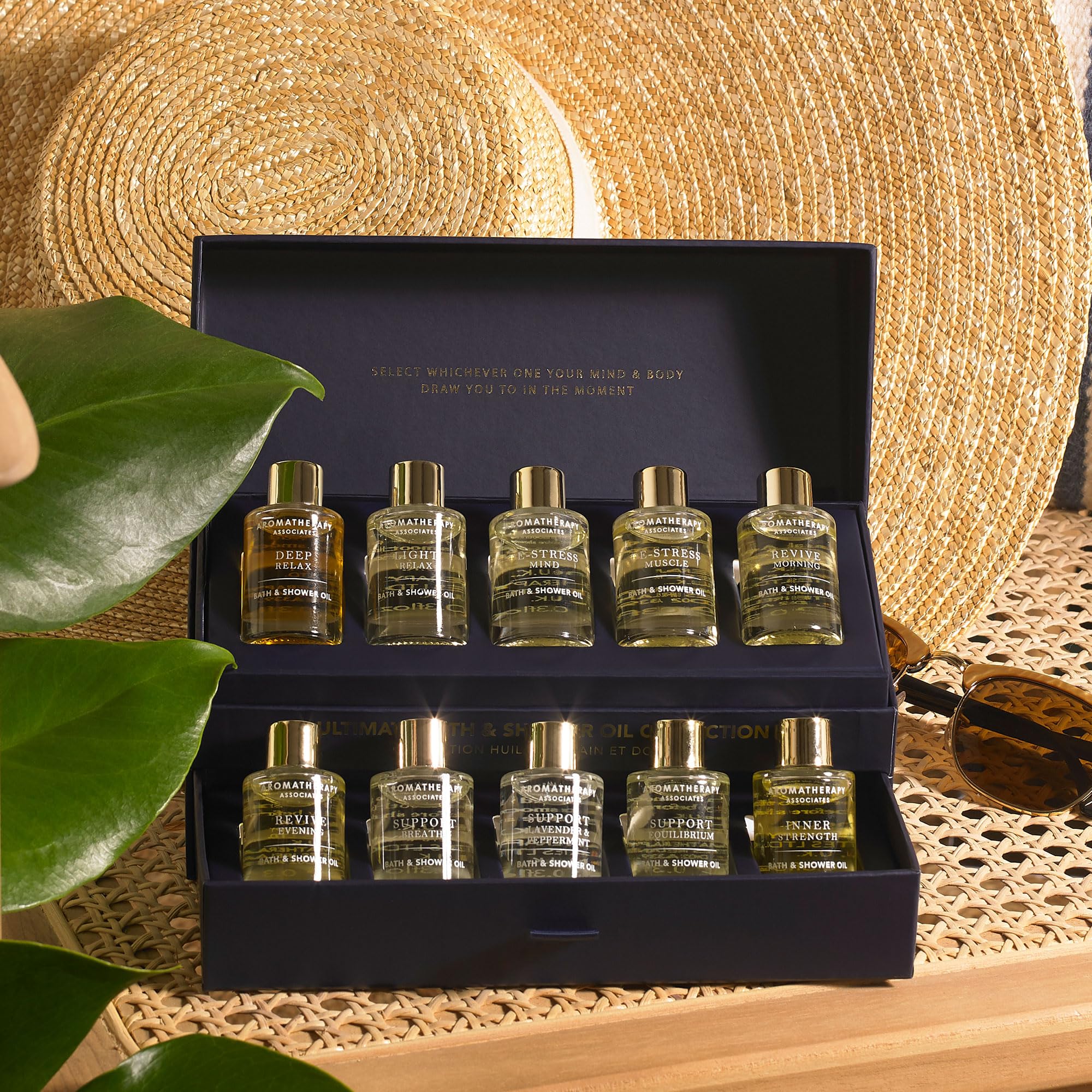 Aromatherapy Associates relaxation massage oil with users applying during routine.