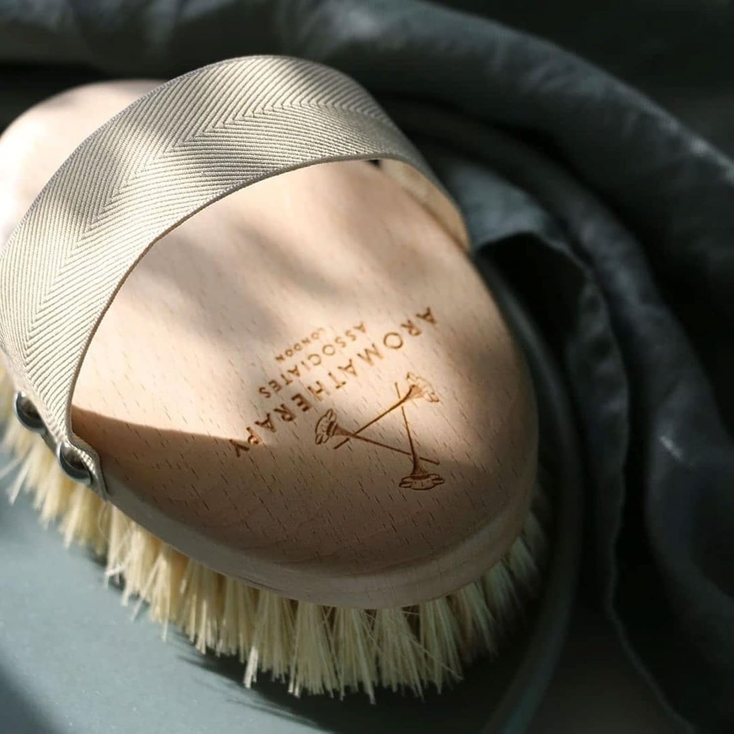 Sleek packaging of Aromatherapy Associates Revive Brush.