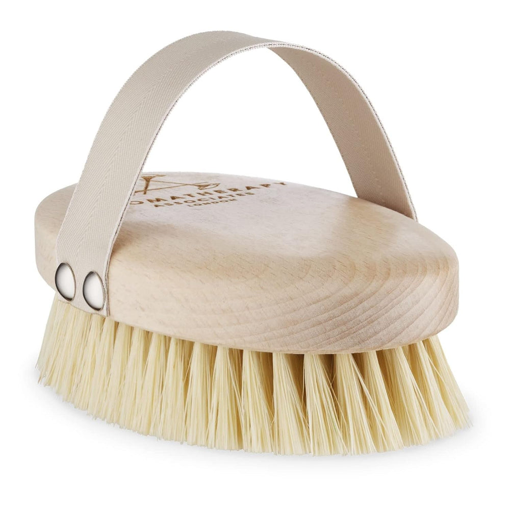 Rounded-tip bristles cushion skin during dry brushing.