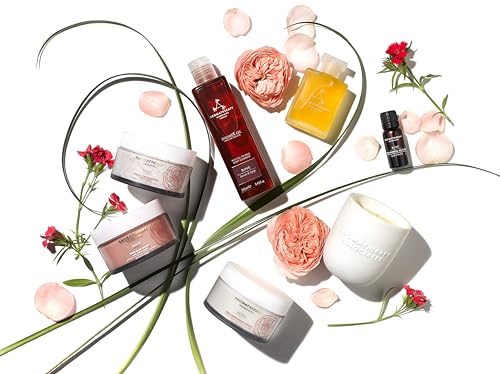 Aromatherapy Associates Rose Shower Oil being massaged in hand as it emulsifies to a milky texture.