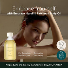 AROMATICA Embrace Body Oil being massaged for moisturizing feel after shower