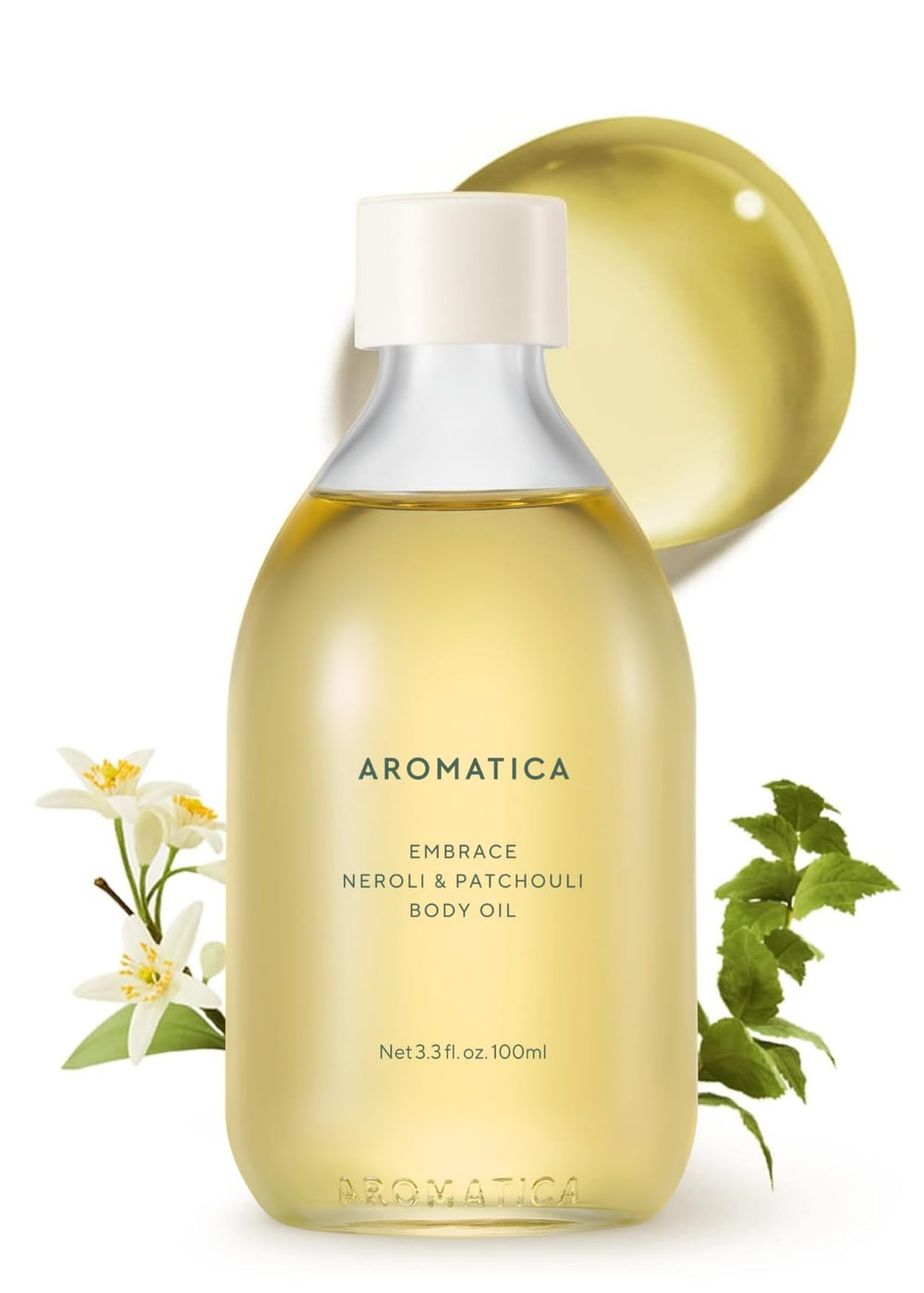 AROMATICA Embrace Body Oil bottle close-up highlighting patchouli-neroli blend for calming routine