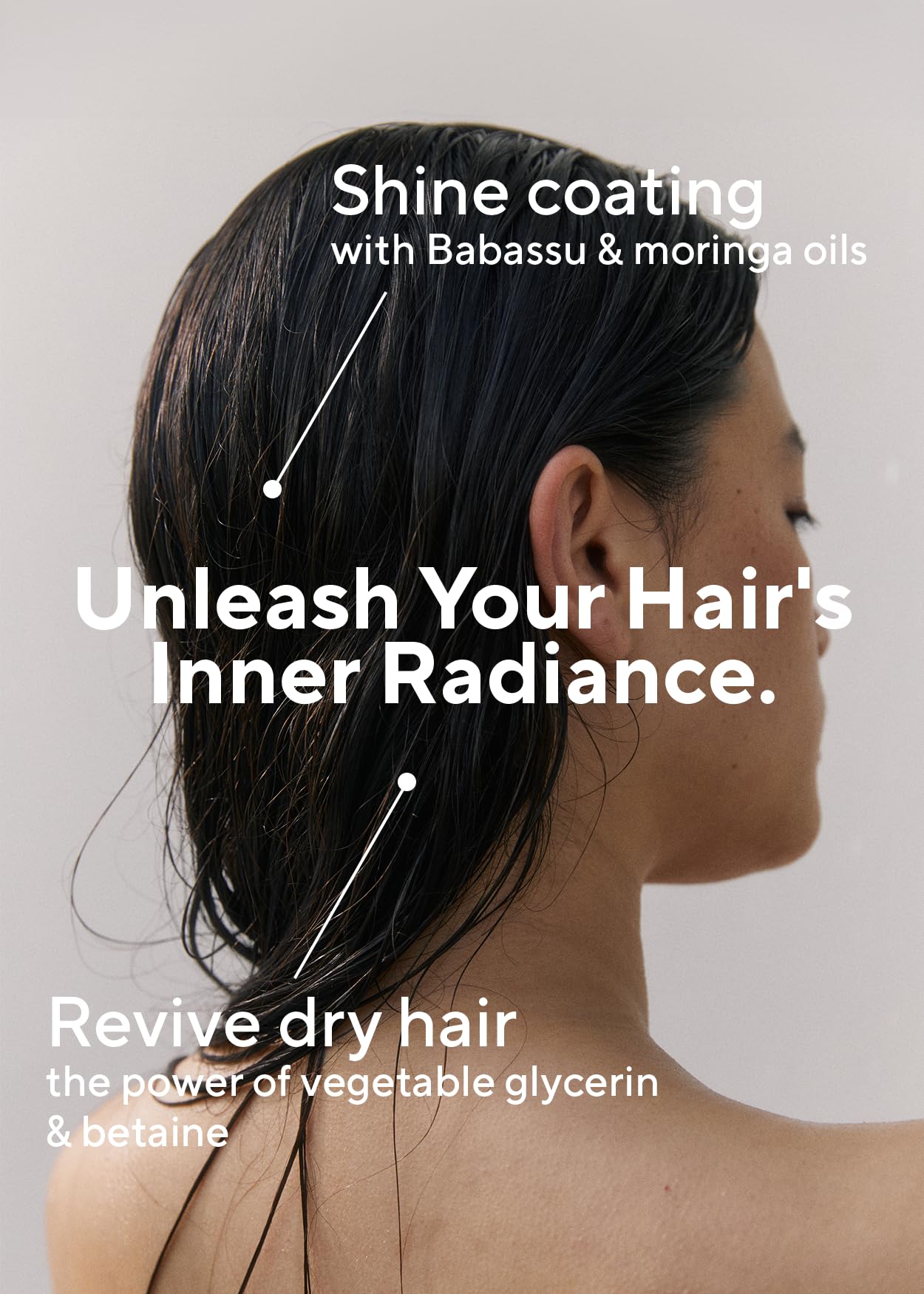 AROMATICA treated hair close-up shows hydrated, soft strands after washing.