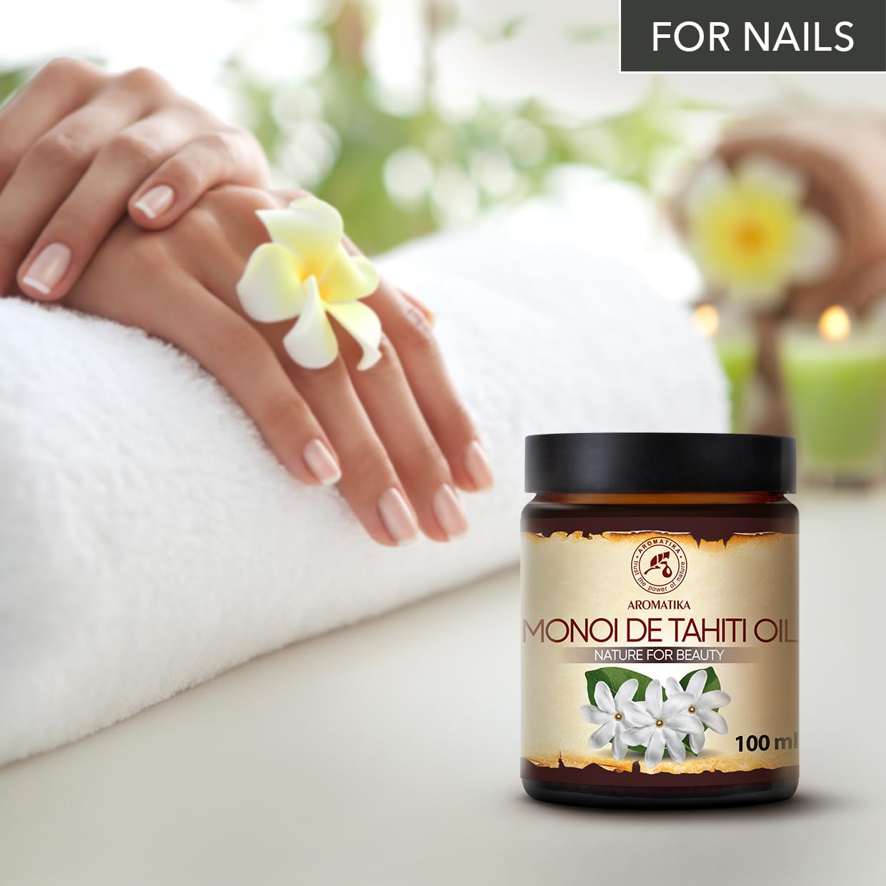 AROMATIKA Monoi Tahiti carrier oil on hand for facial massage and moisture