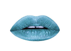 Aromi Arctic Teal Metallic Lipstick tube with bold, long-lasting color and shimmer.