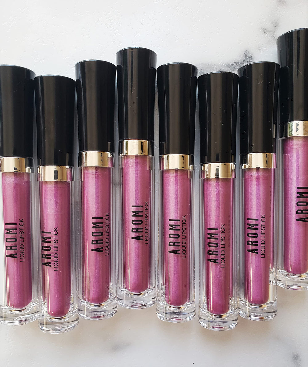 Aromi Berry Fuchsia applicator applying color smoothly