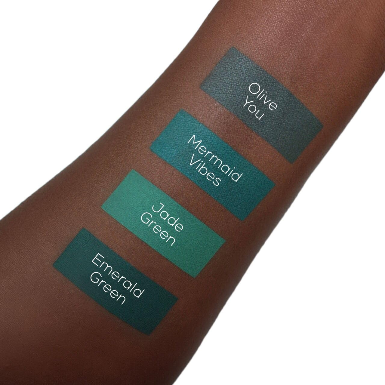 Aromi emerald green lipstick worn for bold, statement lip looks