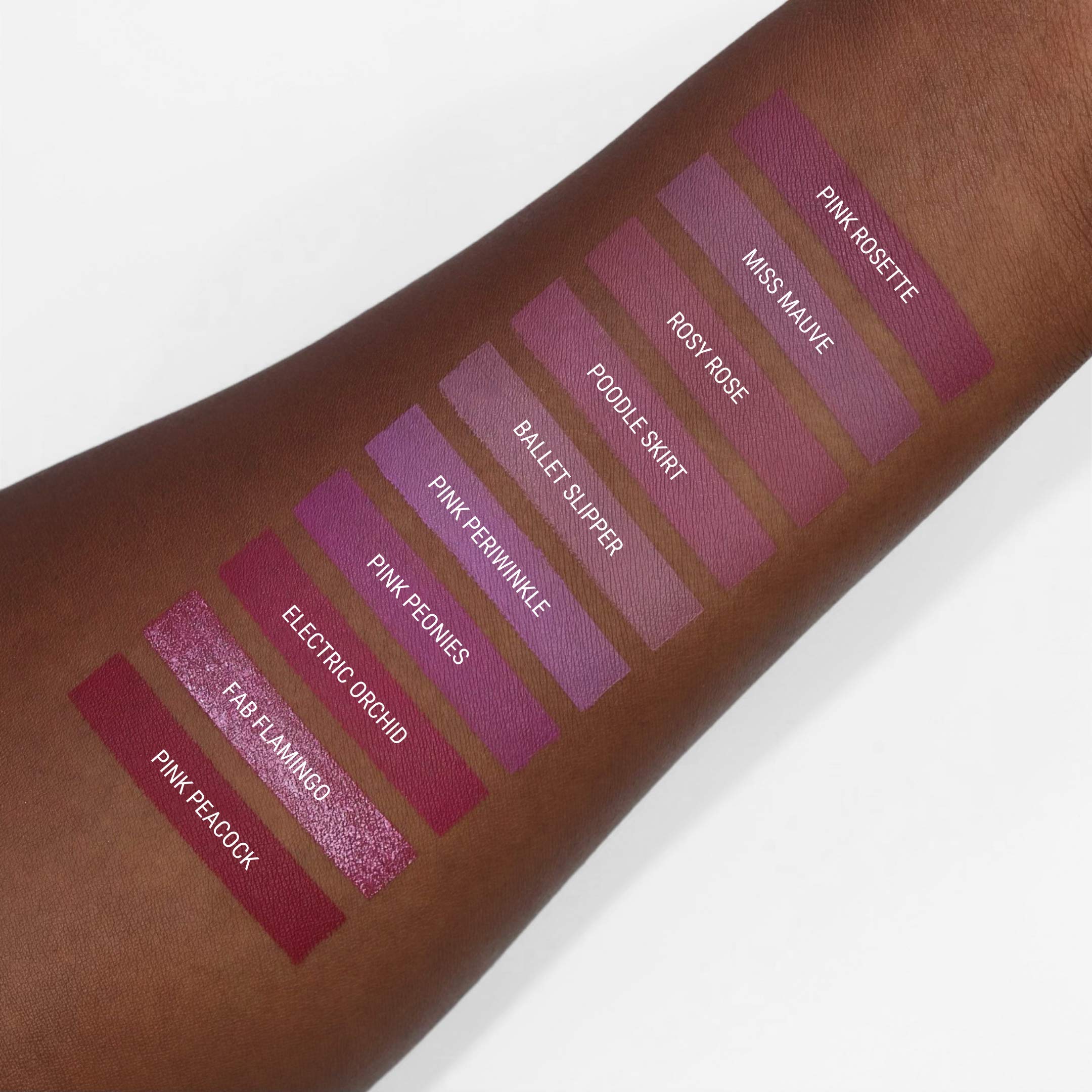 Aromi hot pink metallic finish on lips offers luminous color.