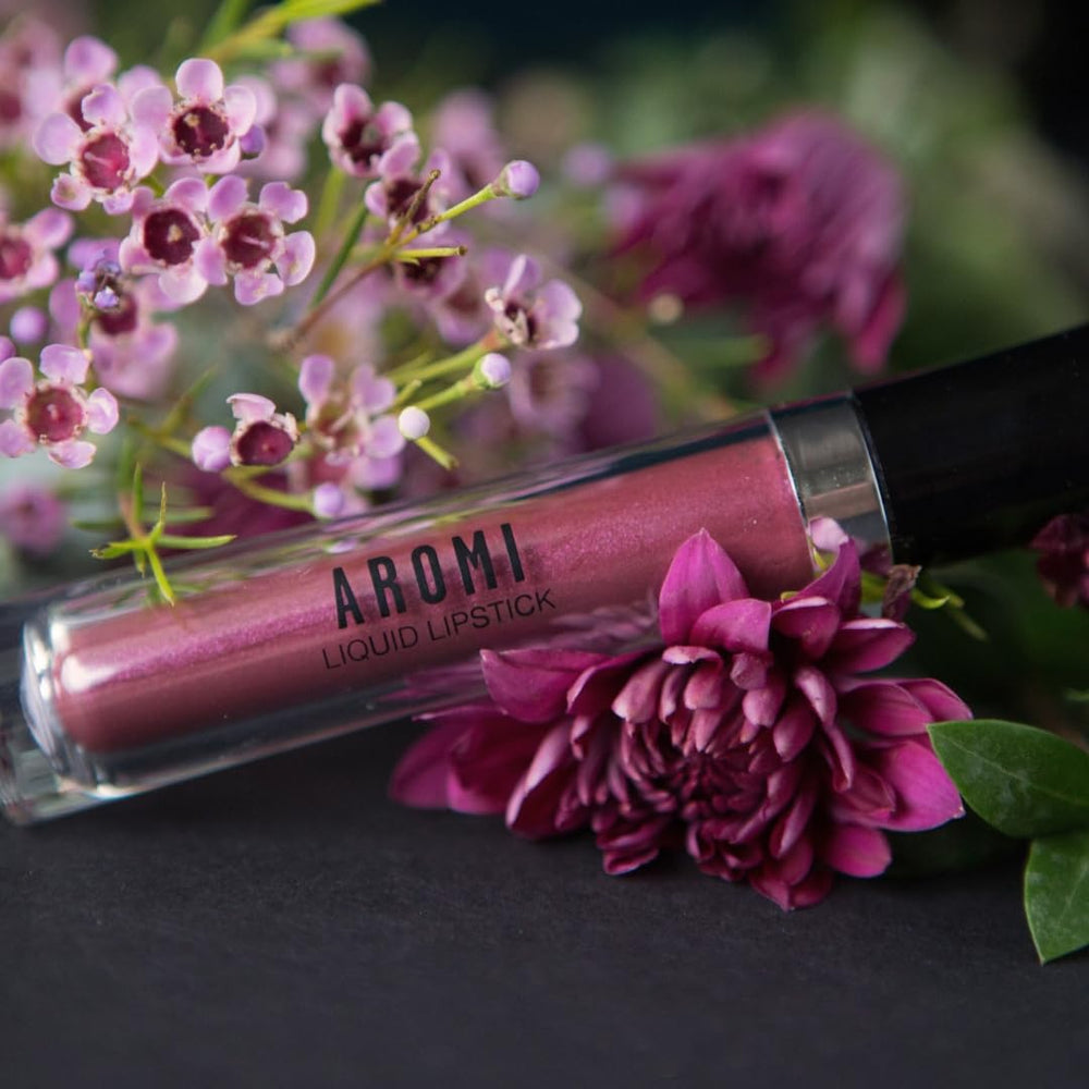 Aromi Matte-metallic finish on lips suggests all-day shine with comfort.