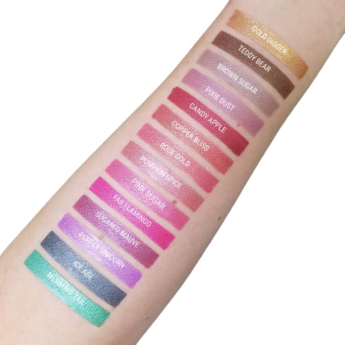 Aromi metallic liquid lipstick swatch demonstrates easy glide and bronze glow
