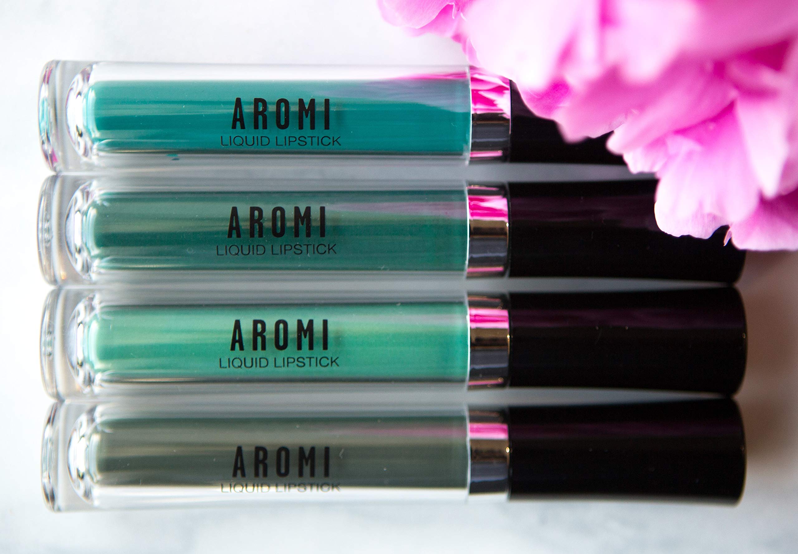 Aromi paraben-free formula badge signals gentle, skin-friendly makeup