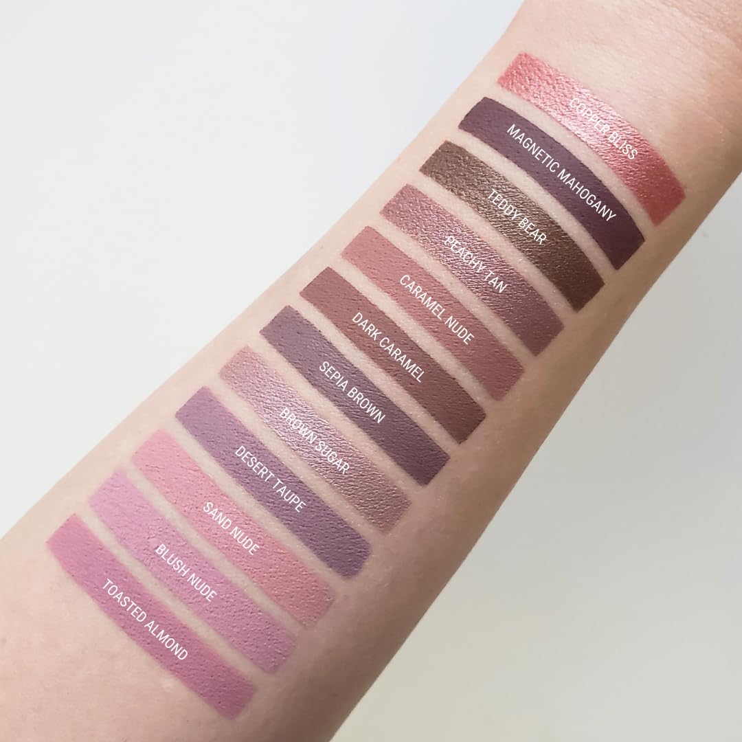 Aromi Tan Metallic Lipstick on model selfie shows bold yet wearable color.