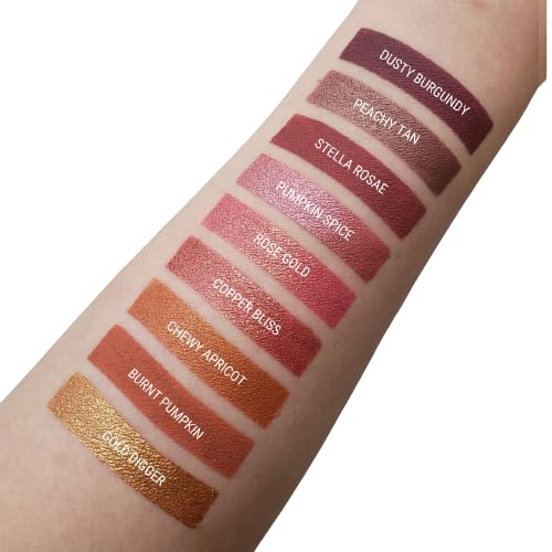 Aromi Tan Metallic Lipstick Sepia Bronze swatch on arm shows metallic sheen.